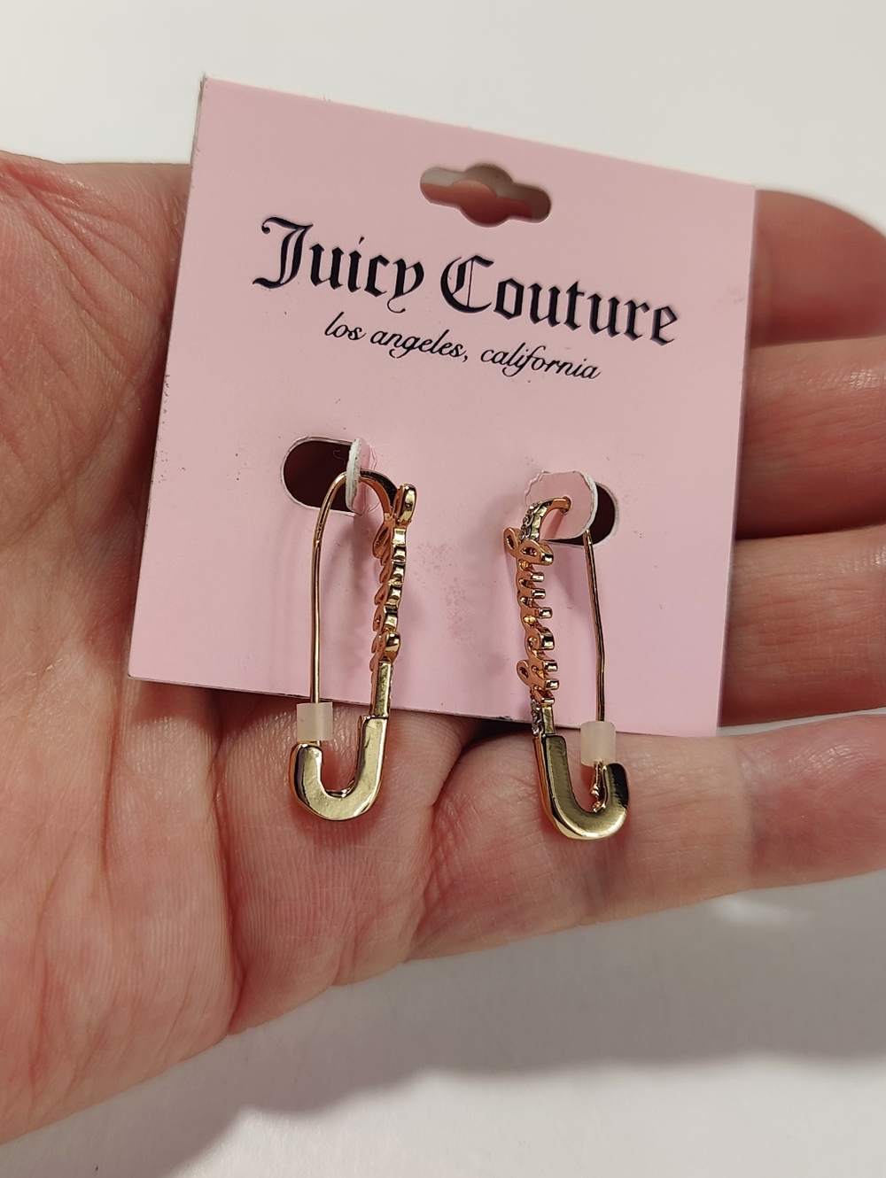 Juicy Couture Gold Tone “Juicy” Safety Pin Earrings Rhinestone Logo Dangle New